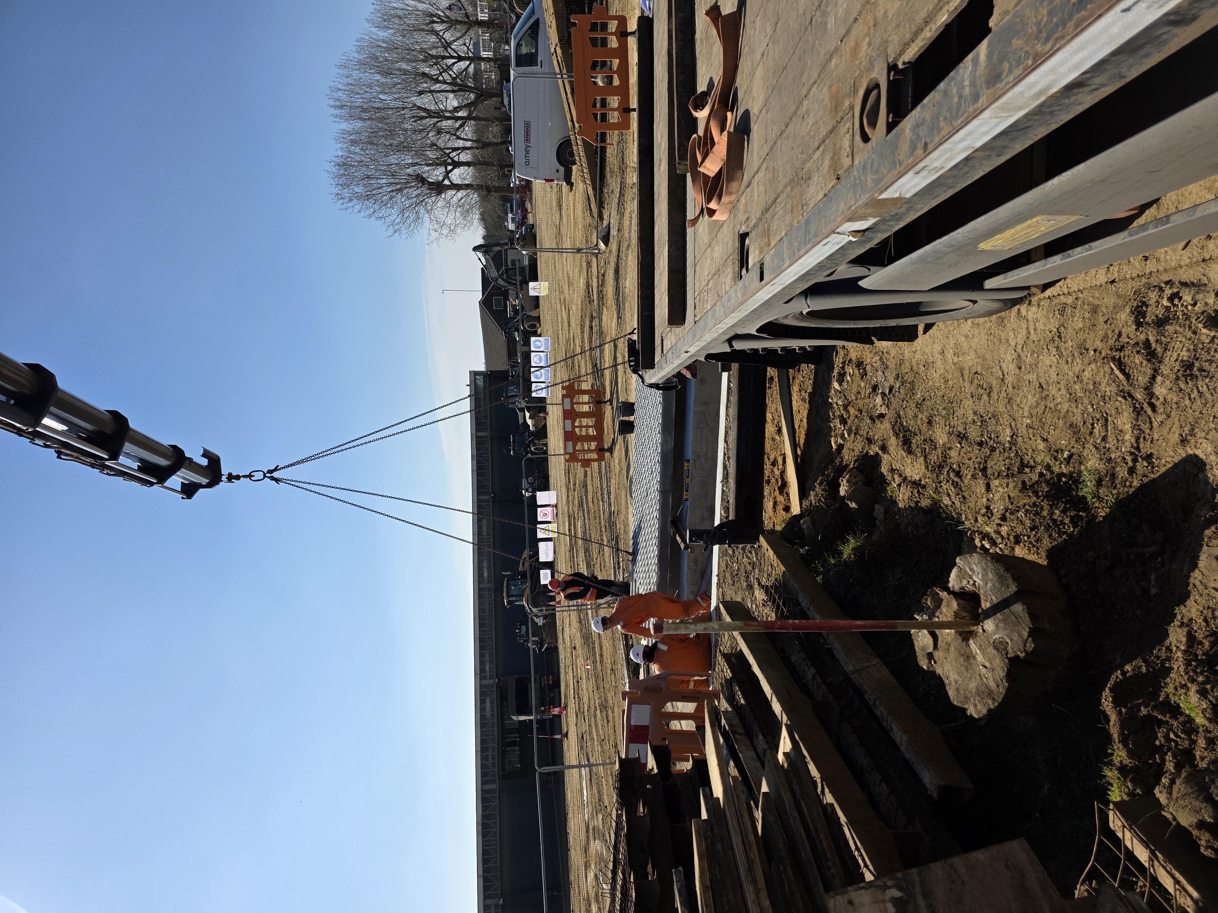 HIAB crane arm performing a precise placement operation