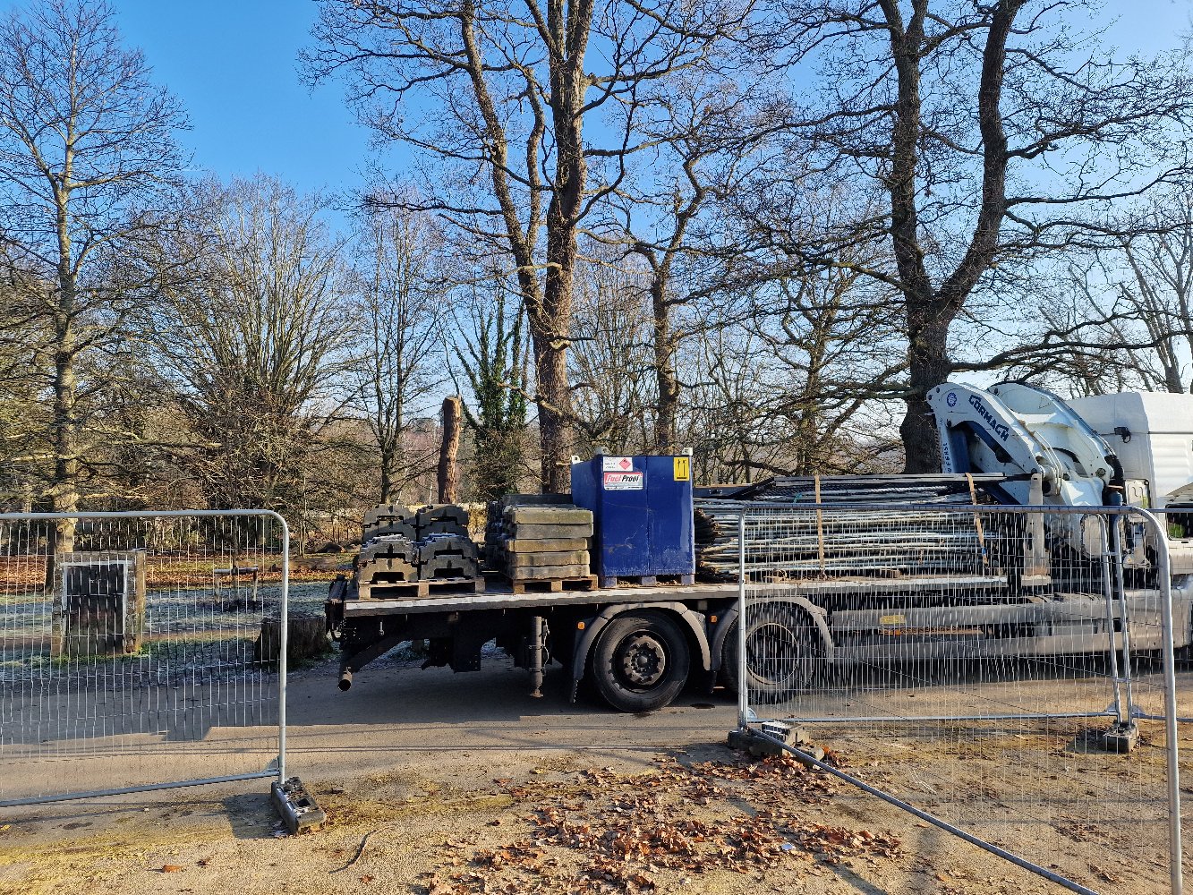 HIAB crane lifting steel beam on construction site, Kent
